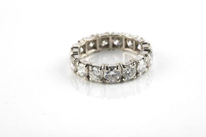 American white gold wedding ring adorned...
