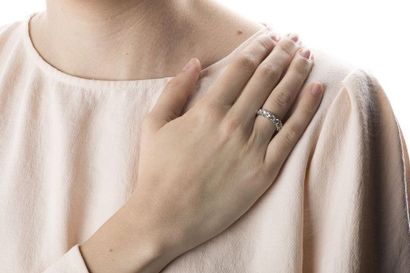 American white gold wedding ring adorned...