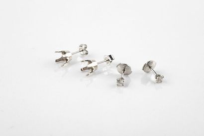 Pair of white gold ear studs, decorated with...