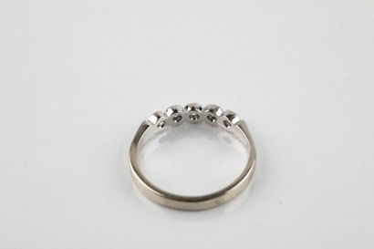 Half wedding ring in white gold set with...