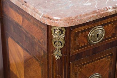 Chest of drawers made of rosewood veneer...