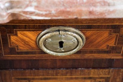 Chest of drawers made of rosewood veneer...