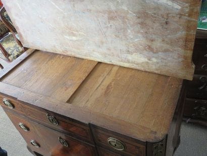 Chest of drawers made of rosewood veneer...