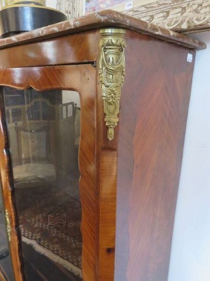Showcase in rosewood veneer and satin-finish,...