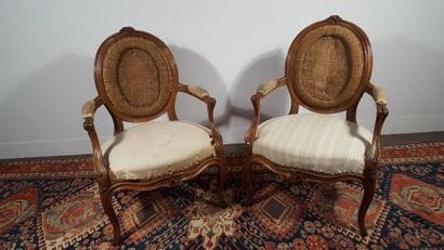 Pair of walnut armchairs moulded and carved...
