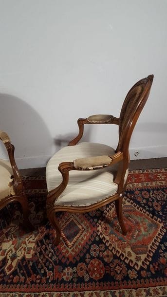 Pair of walnut armchairs moulded and carved...