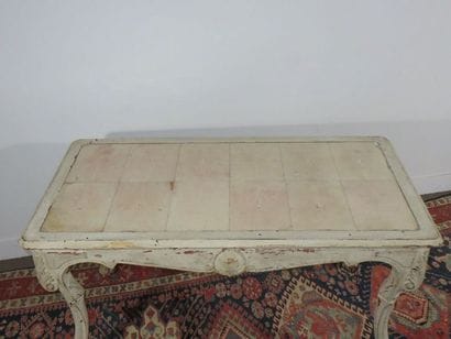 Middle table in cream lacquered wood, moulded...