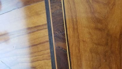 Changer table in walnut with maple inlaid...