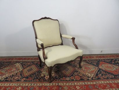 Large and wide armchair with flat back in...