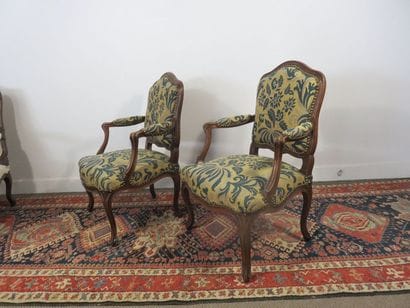 Pair of flat-backed armchairs in moulded...