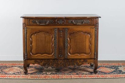 Moulded and carved walnut sideboard base....