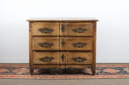 Moulded and carved walnut chest of drawers...
