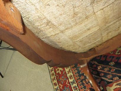 Armchair with flat back in moulded and carved...