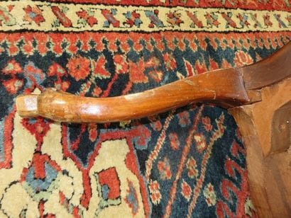 Armchair with flat back in moulded and carved...