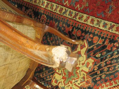Armchair with flat back in moulded and carved...