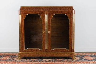 Low bookcase in marquetry of violet wood...