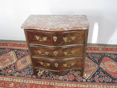 Small chest of drawers made of curly veneer...