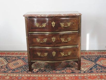 Small chest of drawers made of curly veneer...