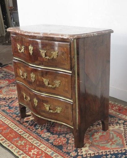 Small chest of drawers made of curly veneer...