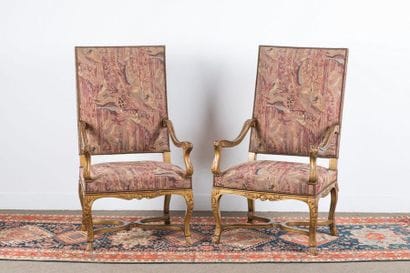 Pair of armchairs in moulded and carved gilded...