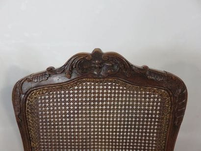 Pair of moulded beech chairs, cane seat and...