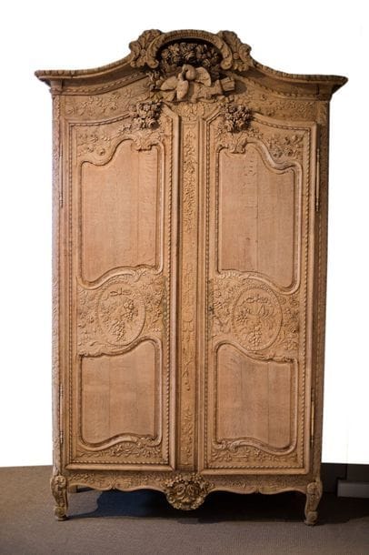 Moulded and carved oak wedding cabinet. It...