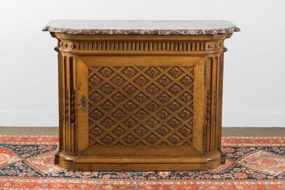 Moulded and carved oak sideboard, top rail...