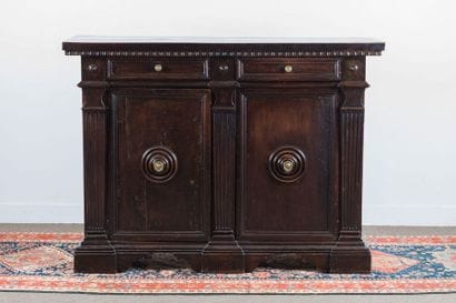 Moulded and carved patina walnut sideboard....