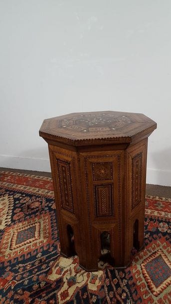 Octagonal pedestal table with rich marquetry...