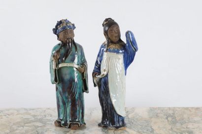 CHINA Couple in Shiwan sandstone, the man...