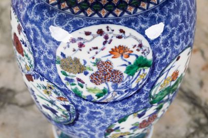 CHINA Polychrome porcelain vase with flowers...