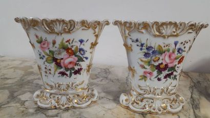 Pair of polychrome porcelain bridal vases...