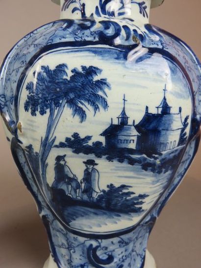 DELFT Pair of covered earthenware vases with...