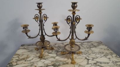 Paire de bougeoirs en bronze doré et argenté...