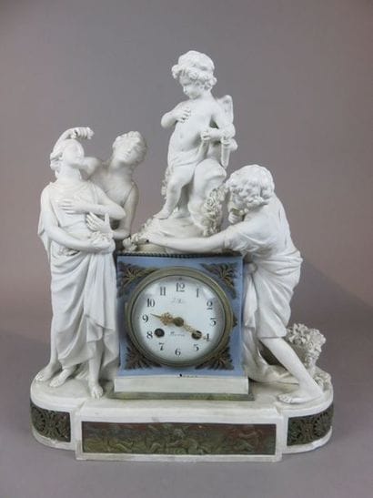 Pendule en biscuit. Le mouvement dans une...