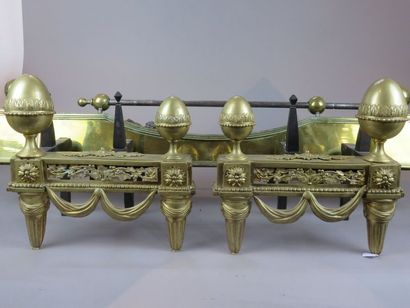 Pair of ormolu bronze andirons, the tapered...