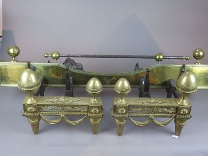 Pair of ormolu bronze andirons, the tapered...