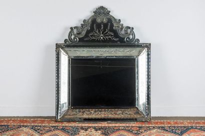 Mirror of Venice in bevelled glass and engraved...