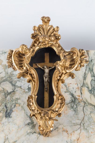 Gilded carved wood stoup with a frame of...