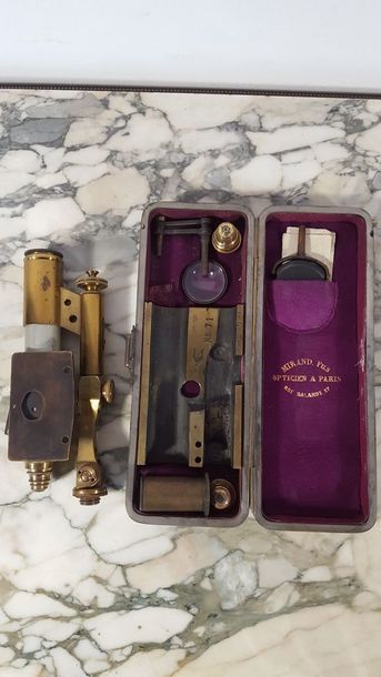 Small dismountable bronze microscope in its...