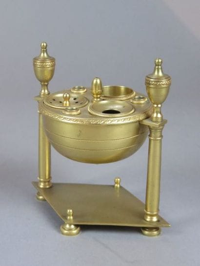 Desk set forming an inkwell in chased and...