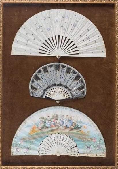 Set of three fans framed and presented under...