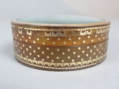 Small round box inlaid with stars and gilded...