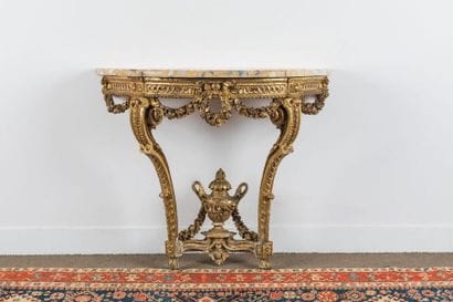 Moulded and carved gilded wood half-moon...