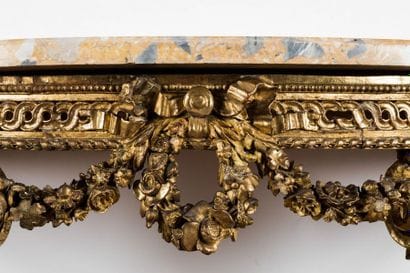Moulded and carved gilded wood half-moon...