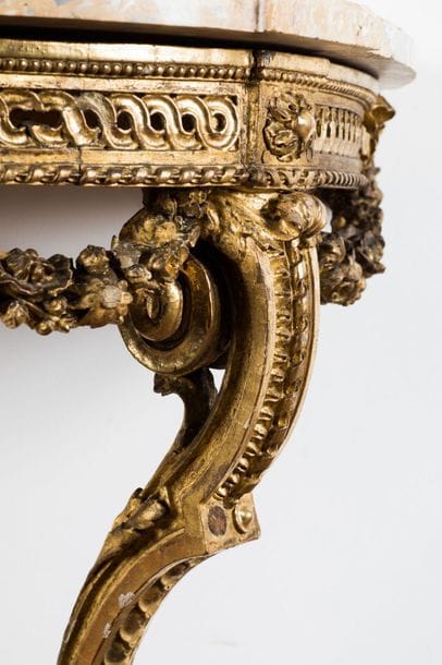 Moulded and carved gilded wood half-moon...