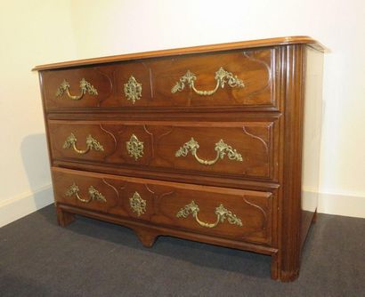 Moulded walnut chest of drawers opening with...