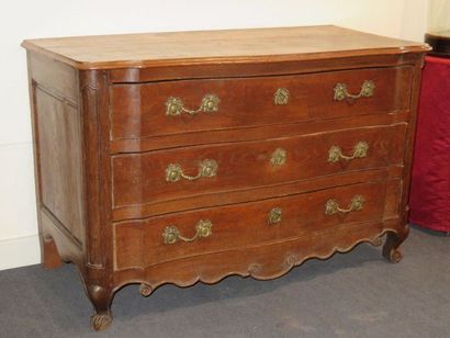 Moulded elm chest of drawers with three moving...