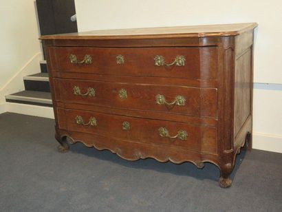 Moulded elm chest of drawers with three moving...