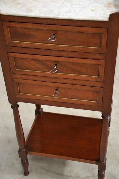 Mahogany chiffonnière table with three framed...